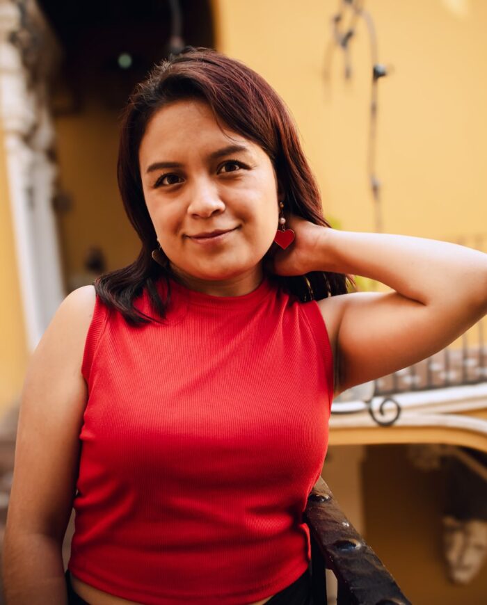 Charming portrait of a woman in a red top in Puebla, Mexico